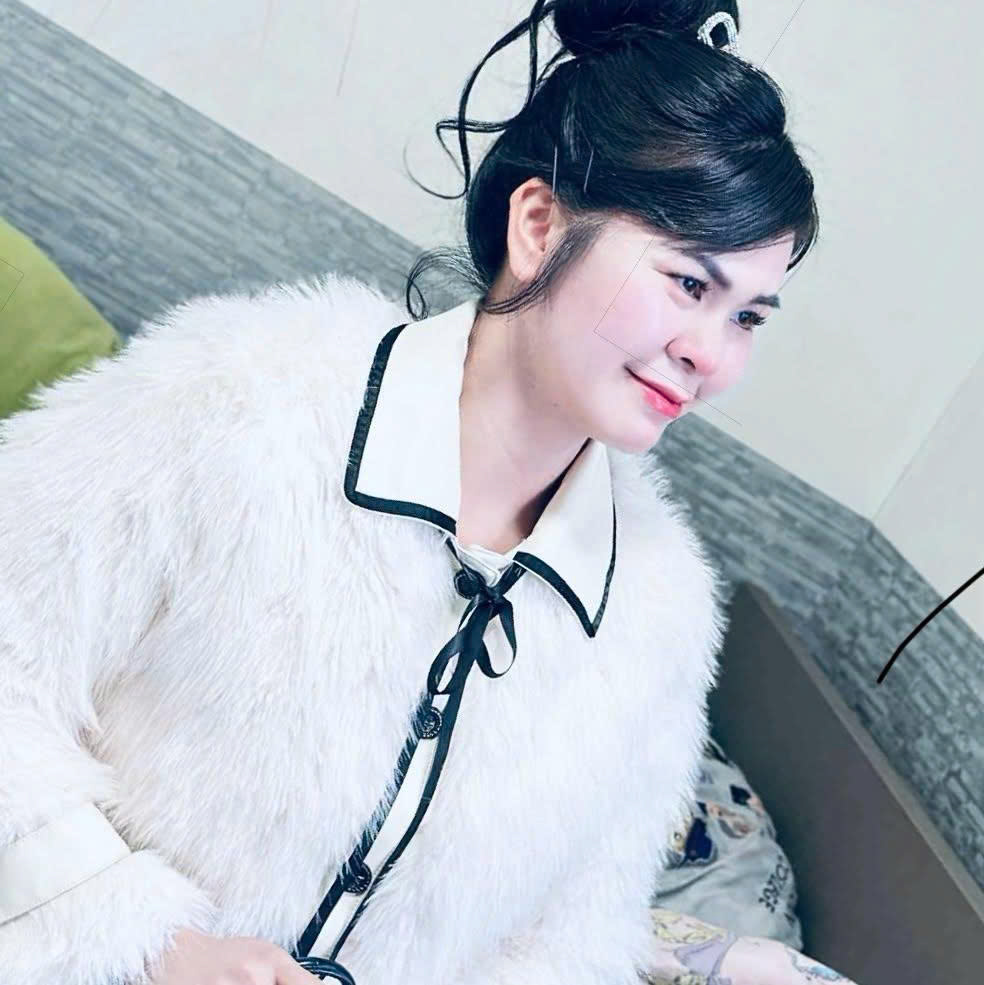 Smiling Woman in Shaggy Coat — © SIGIL