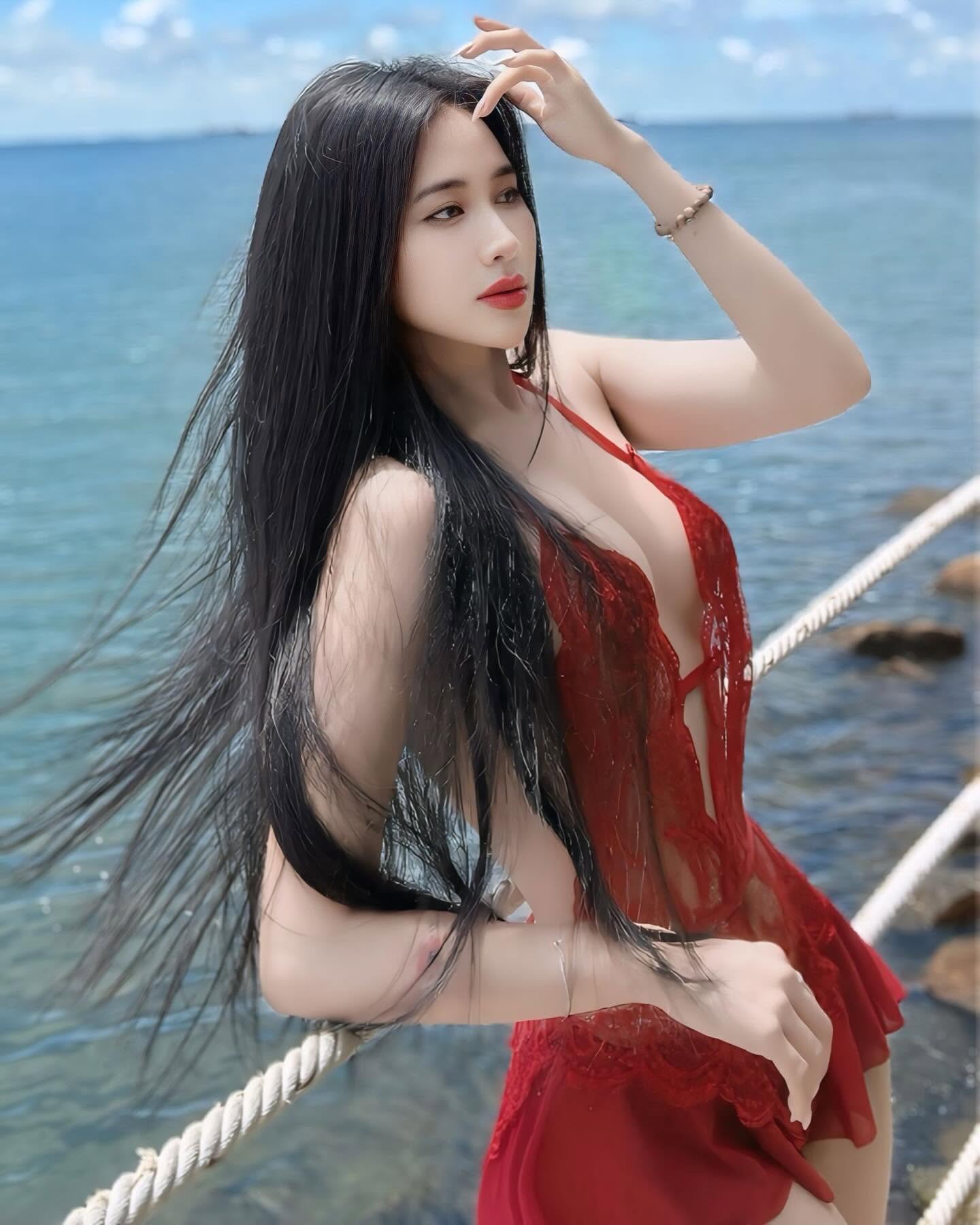 Lady in Red Lace by the Sea — © SIGIL